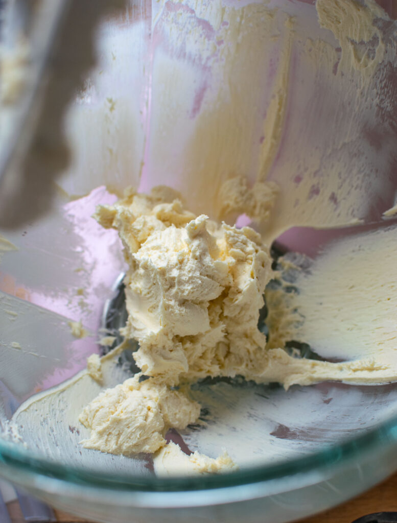 Butter and cream cheese blended together to make cream cheese frosting.