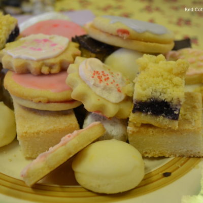 A plate of cookies for afternoon tea including lemon melt away cookies.