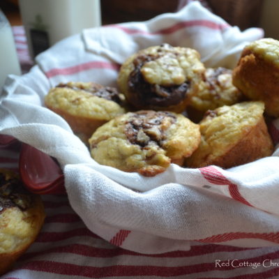 A basket of banana hazelnut muffins.