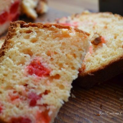 A slice of cherry quick bread.