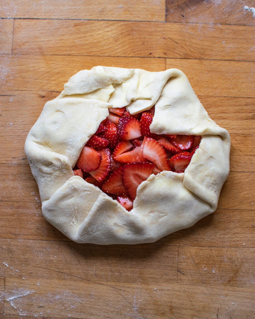 A strawberry galette before it is baked.