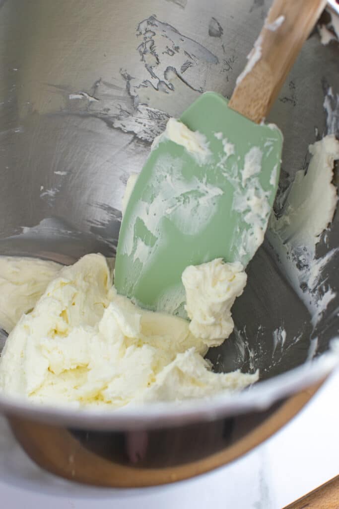 Cream cheese beaten in a stand mixer until very soft.