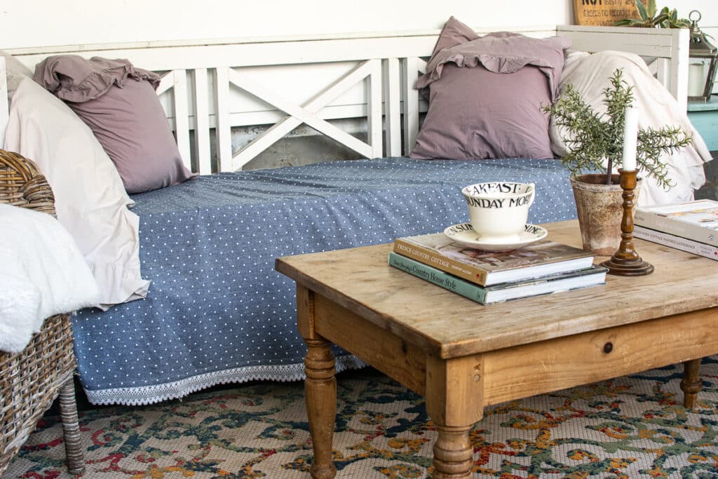 A thrifted coffee table in a summer porch.