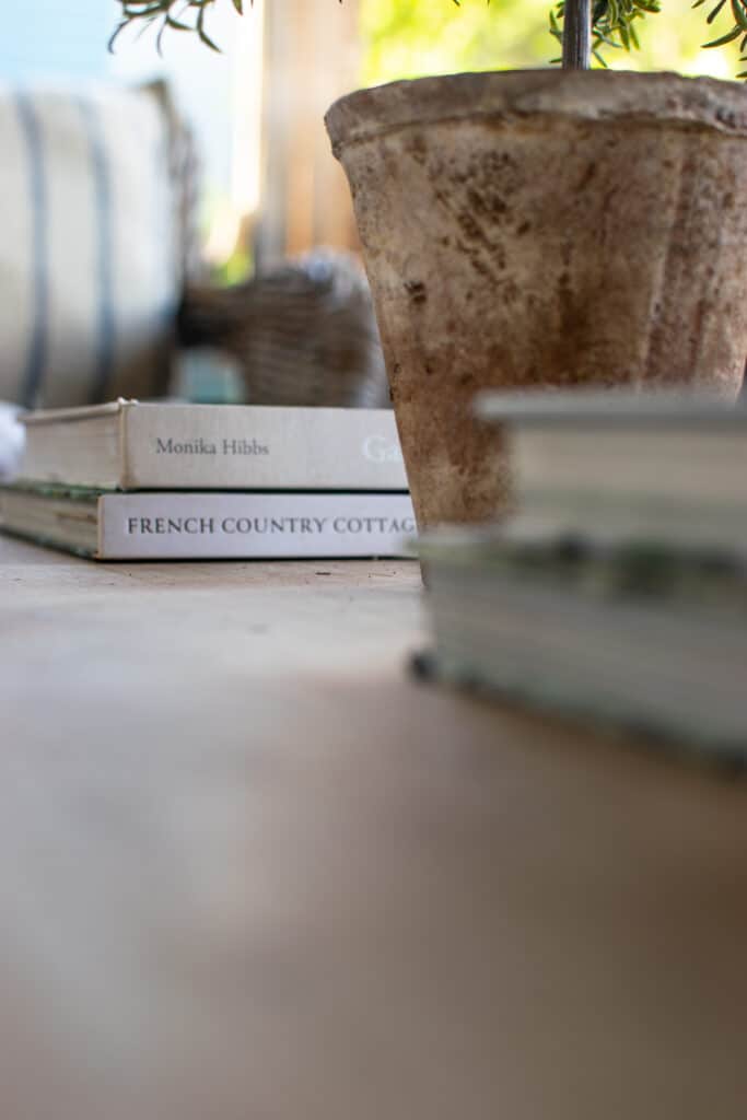 Stacks of books on a coffee table