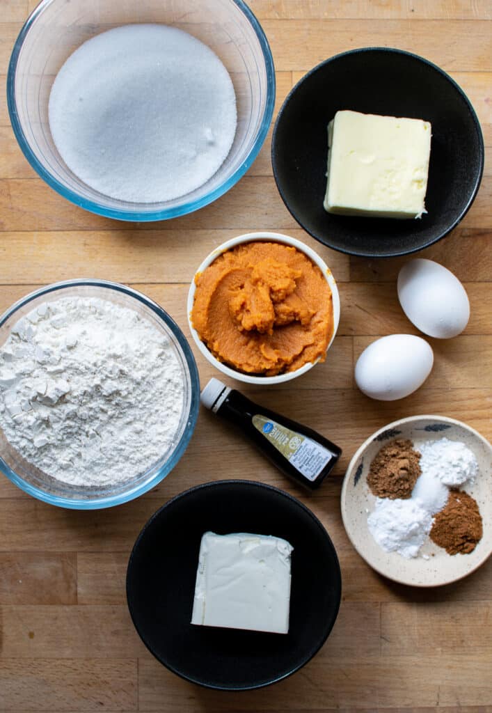 Overhead view of ingredients for pumpkin cheesecake cookies.