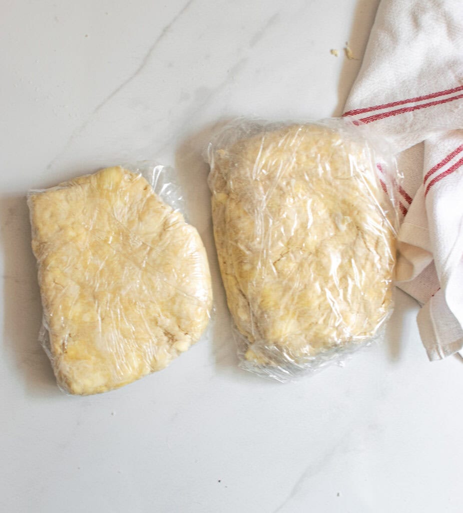 2 portions of pie pastry wrapped in plastic wrap