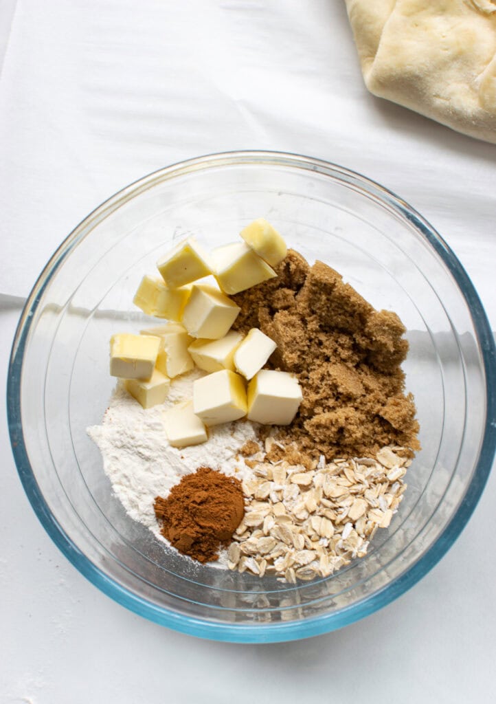 A bowl of ingredients to make oat crumble topping.