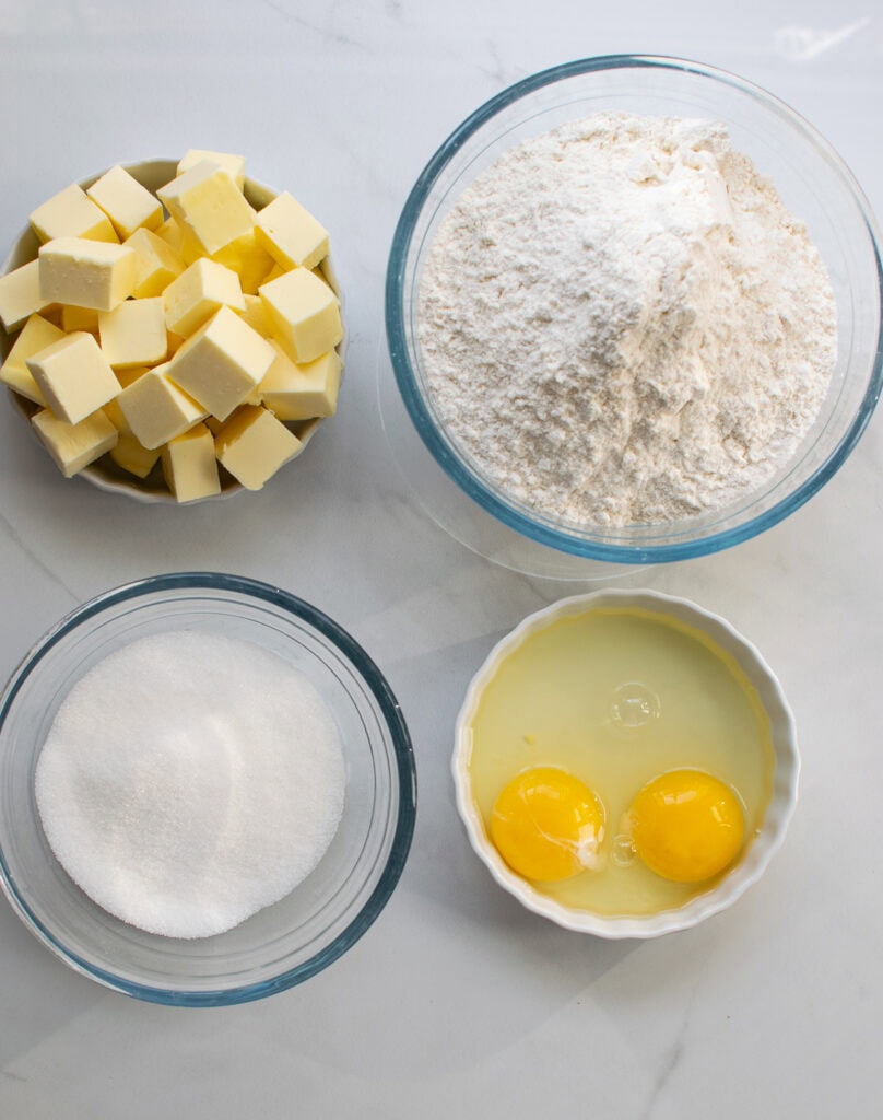 Overhead view of ingredients to make sweet pastry dough.