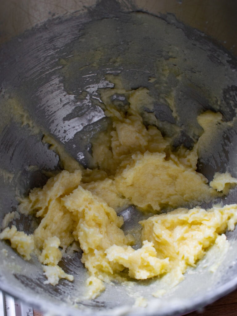 Butter and sugar creamed until light and fluffy in the bowl of a stand mixer.