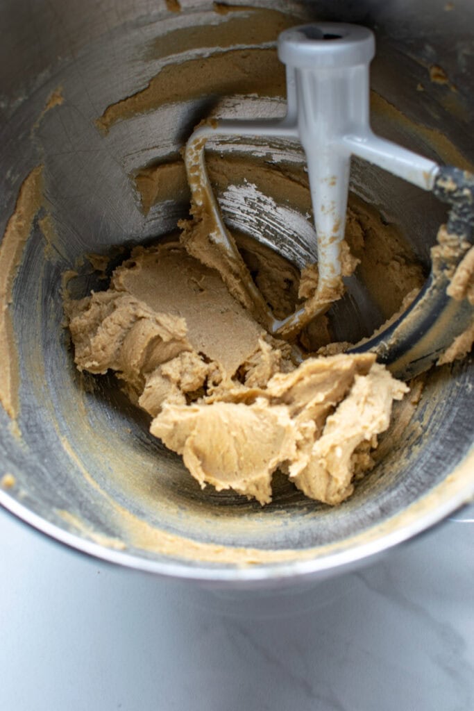 Butter and brown sugar creamed together in bowl of an electric mixer.