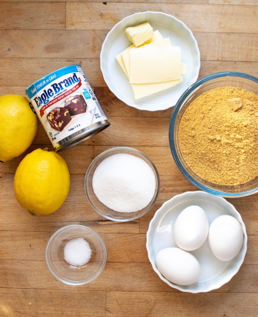 Ingredients needed to make lemon squares with graham cracker crust.