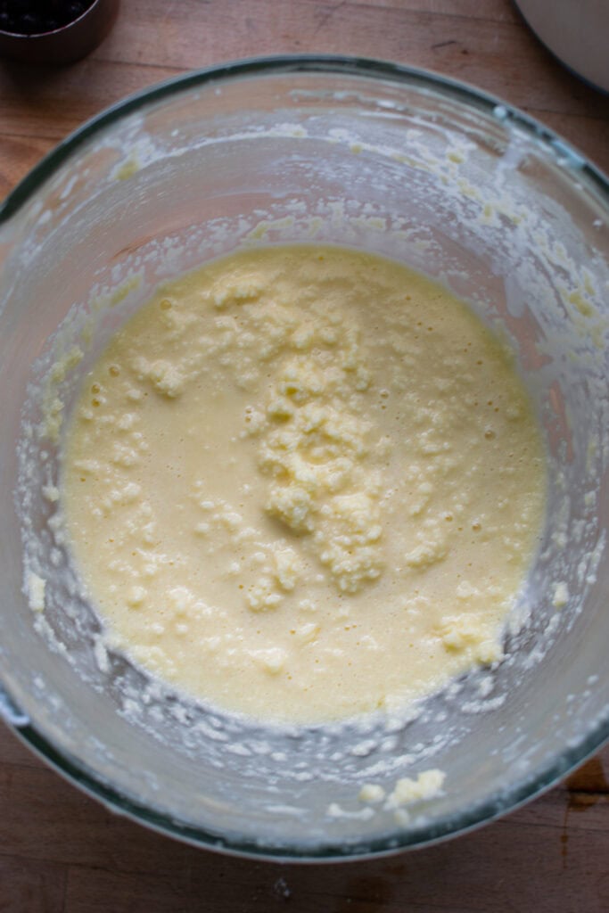 Process photo of wet ingredients mixed together to make a coffee cake.