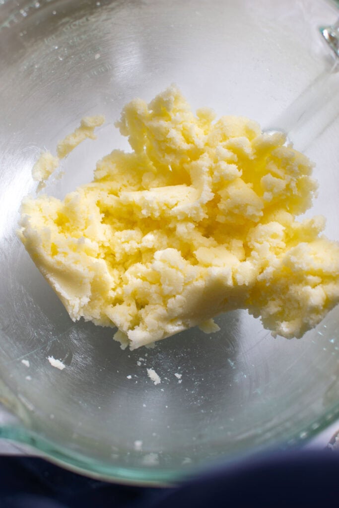 butter and sugar creamed together in the bowl of an electric mixer.